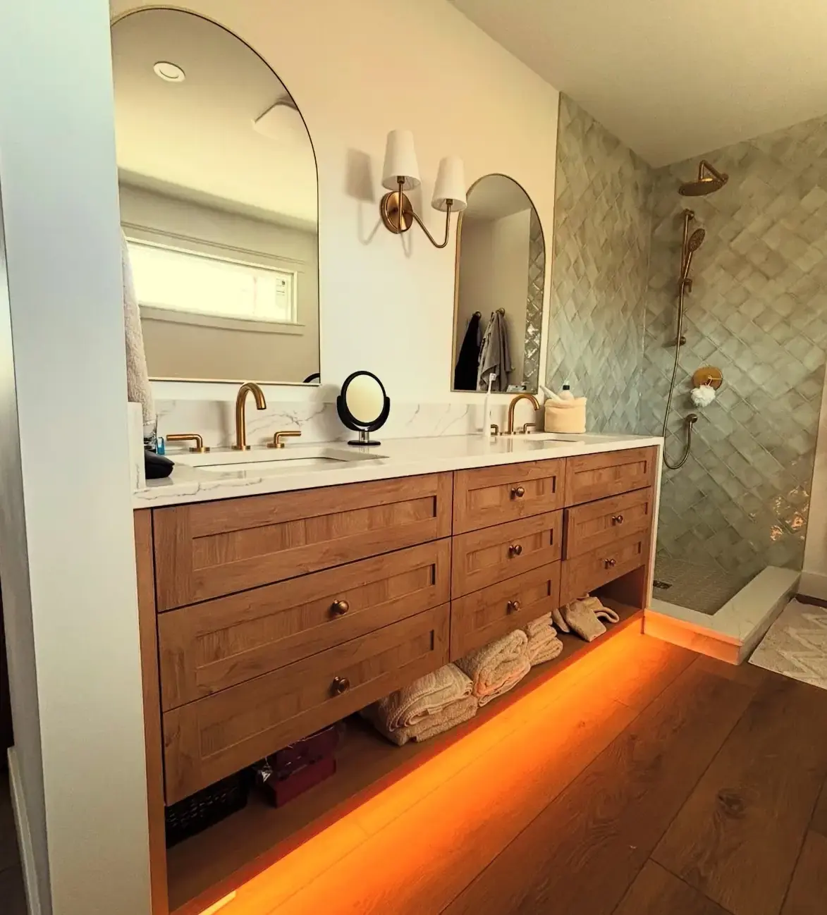 Professional electrical renovation work showcasing modern kitchen lighting installation with recessed lights, pendant fixtures, and ambient LED accent lighting